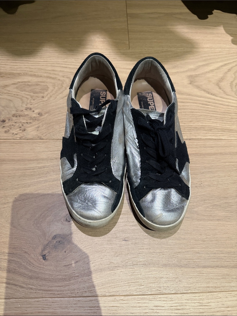 Golden Goose Silver and Black Superstar Sneakers